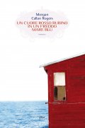 Un cuore rosso rubino in un freddo mare blu